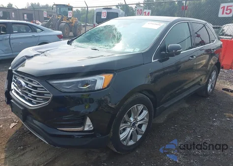 2022 Ford Edge Titanium z USA, uszkodzony, nr VIN 2FMPK4K90NBA39071